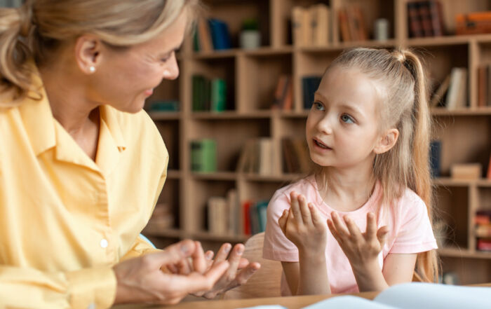 A child undergoing a dyslexia assessment with a teacher at READ Academy in Sacramento, CA.